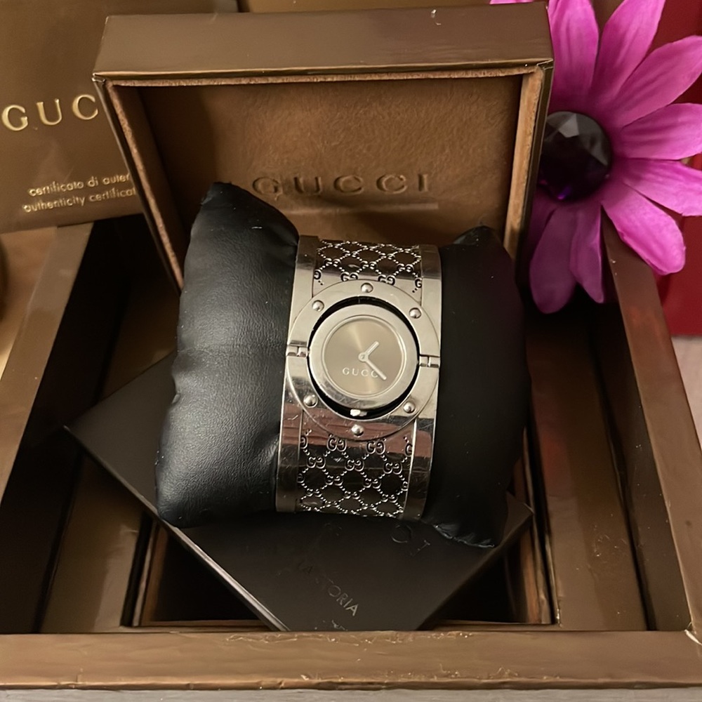 Gucci Twirl Watch Retail was $2399. Comes with watch box inside box. W Gucci Bag